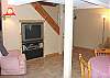 Second View - Downstairs Family Room with TV, Table for 4, Twin/Double Bunk Bed and a Hide-a-bed for additional sleeping.