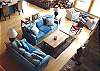 Second view - Lower level - Large living room with flat screen TV/DVD, wood burning fireplace, and sitting area with telescope.  Spectacular ocean views!