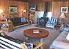 Living room with TV/DVD, hide-a-bed, wood stove