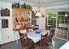 Lower level - Dining table for 6 with 2 extra chairs, slider to back deck.
