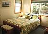 Lower level - Bedroom with a Queen bed.