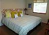 Upper level bedroom with a King bed.