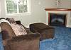 Upper level - Private reading room with gas fireplace and mini fridge.