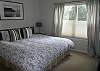 Lower level - Master Bedroom with a King bed and walk-in closet. Has its own private bathroom with shower.