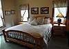 King bed, TV and private bath.