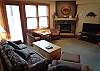 Cozy up by the gas fireplace and watch your favorite movie on the flatscreen TV