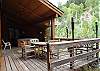 6 person hot tub, large deck area, tiki torches and a grill