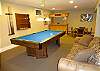 Lower level features pool table, foosball and a dart board