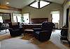 Large master with king bed, TV, private bath and entrance to deck
