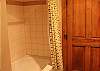Master bath has tub shower combination