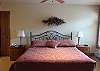 The oversized master bedroom is a perfect place to retreat to.  It features a king sized bed, cable TV, and a private bathroom.
