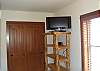 Flat screen TV in third bedroom