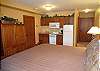 Master bedroom features a kitchentte!