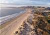 The Pismo Beach coastline offering miles of sandy beach to walk.