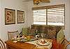 Dining area has seating up to 6 and twin trundle bed can sleep two for an extra sleeping area.