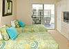 Dual twin beds and a workstation to check e-mail on your  laptop or catch up on some desk work.  This bedroom has its own full bathroom.
