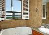 Jacuzzi tub for relaxing after a long walk on the beach.