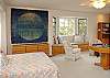 Master Bedroom showing Queen Bed, window seat narrow twin bed, and queen inflatable bed in closet