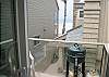 Newer patio with sliding glass door allows you to get a breeze right off the ocean, and a nice place to drink coffee.