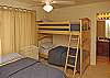 3rd bdrm has twin size bunk beds and single twin bed.