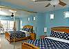 Master bedroom comes with a private deck with views of Mission Bay.