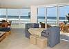 Living area with expansive Nanwall system that completely opens up to experience the beautiful ocean views from the large outside private outside deck.