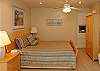 Master bedroom with Queen size bed on the 3rd floor with TV/DVD and steam shower in bathroom.