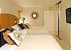 Beautigully decorated in Tommy Bahama style, this bedroom feels like it belongs in a 5 star hotel!