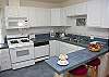 This uit has a full kitchen with all you will need to fix a great meal after a fun day at the beach.