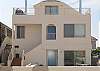 Entrance to unit is on the second level and includes the large deck on the third level with ocean views!