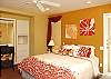 Master bedroom with king bed, bathroom and TV/DVD