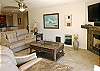Huge sofa sectional with sleeper sofa for cozy nights by the fireplace.