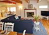 Living Room with Double sofa bed. Pub table seats 4, Dining table has 8 seats and 2 counter stools.
LCD TV and DVD payer.