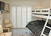 Double/twin bunk beds. Great room for the kids with flat screen TV.