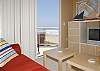 Den/Bdrm has balcony, oceanview. Tv/DVD
