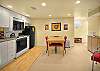 Fully equipped kitchen with dishwasher, full size range, and refrigerator.