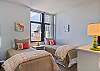 Two twin beds and a television in the second bedroom.  Twins can be made into a king upon request.