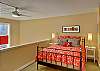 Loft bedroom with queen size bed, en suite bathroom and large closet.