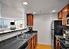 Newly remodeled kitchen with breakfast bar.