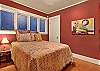 The 2nd bedroom features a queen size bed.