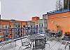 The terrace is right across the vestibule from the condo and it overlooks the courtyard.  Equipped with two gas grills and tables.