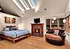 Master Suite features California King bed, flat panel television, wood burning fireplace and sitting areas for taking in the incredible views!