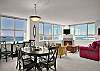 Spacious great room living layout with views from the Space Needle to Puget Sound.