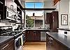 Fully equipped kitchen with stainless steel appliances, cookware, dishware and more!