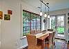 Beautiful windows and French Doors that lead to a patio.