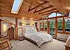 Truly luxurious master suite with flat panel LCD TV and full bathroom.