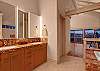 Master bathroom features dual sinks, jetted tub, separate shower, and steam room shower.