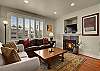 Ample seating area, gas fireplace and flat screen television.