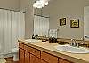 Full bathroom on third floor with His and Her sinks.