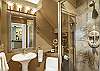 Gorgeous tile and glass shower.